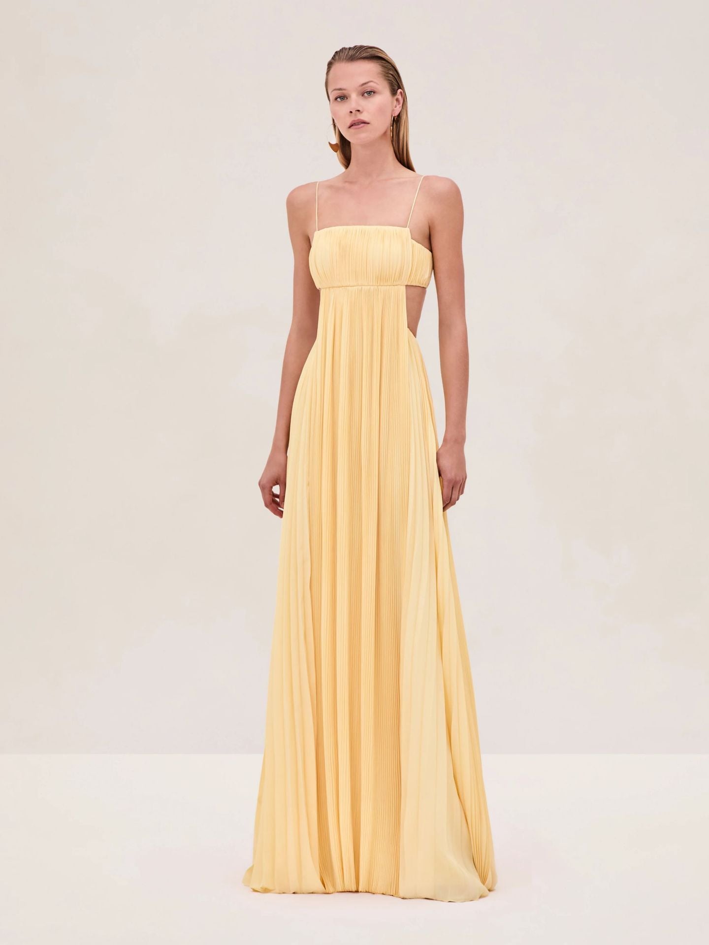 Yellow Slim fit sleeveless cami dress with backless design and zipper closure