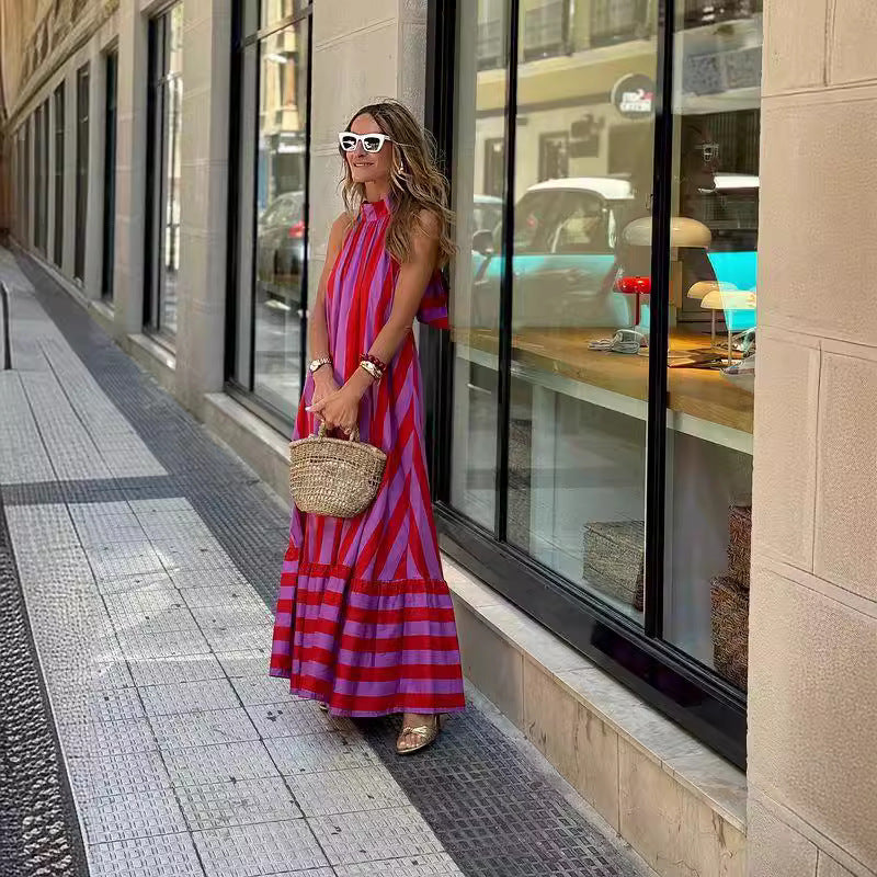 "Halter Backless Striped Maxi Dress."