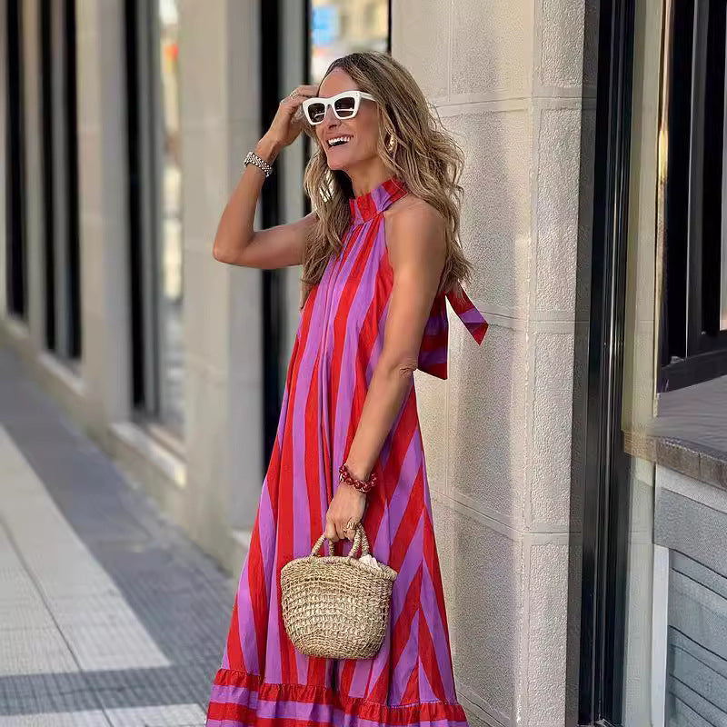 "Halter Backless Striped Maxi Dress."