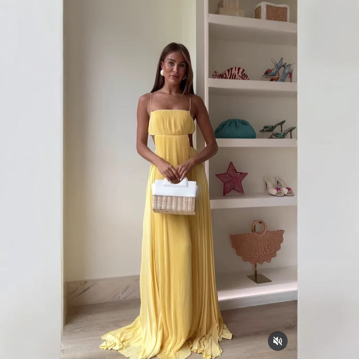 Yellow Backless slim fit maxi dress with cutout and folding elements