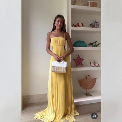 Yellow Backless slim fit maxi dress with cutout and folding elements